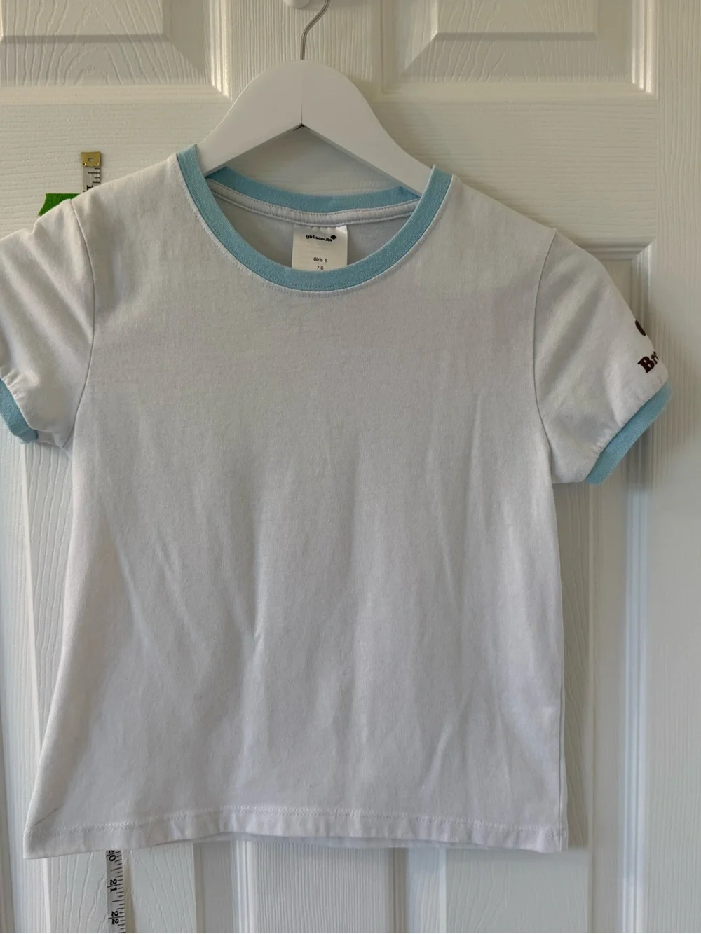 Brownie Girl Scouts Uniform. Tee shirt with skort and socks